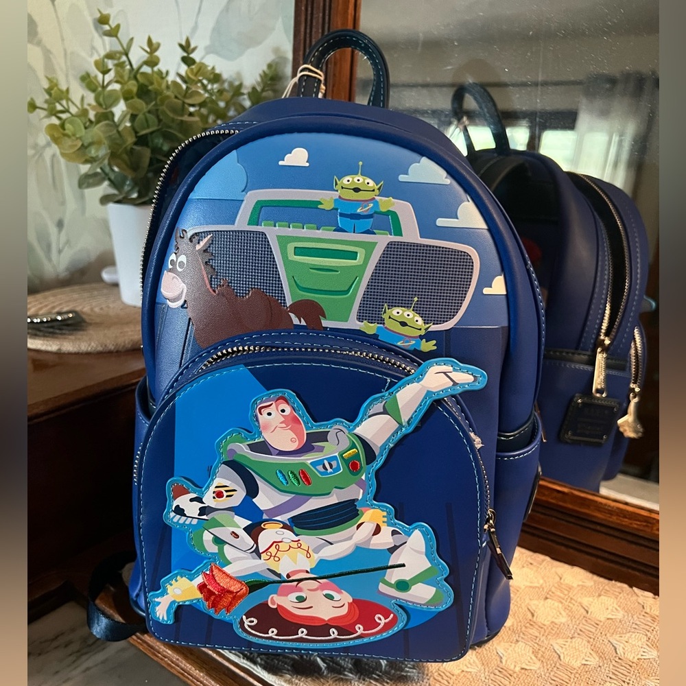 PIXAR x Loungefly Toy Story Moments Jessie & Buzz Lightyear Mini Backpack *NWT*‎